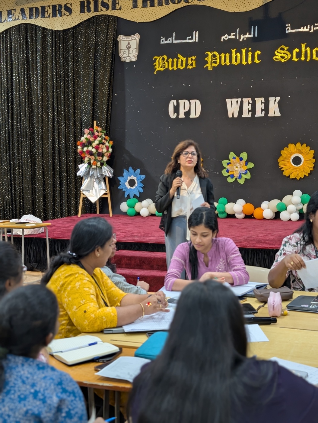 Teachers participating actively in professional development session